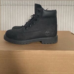 Big kids Timberland boots size 6.